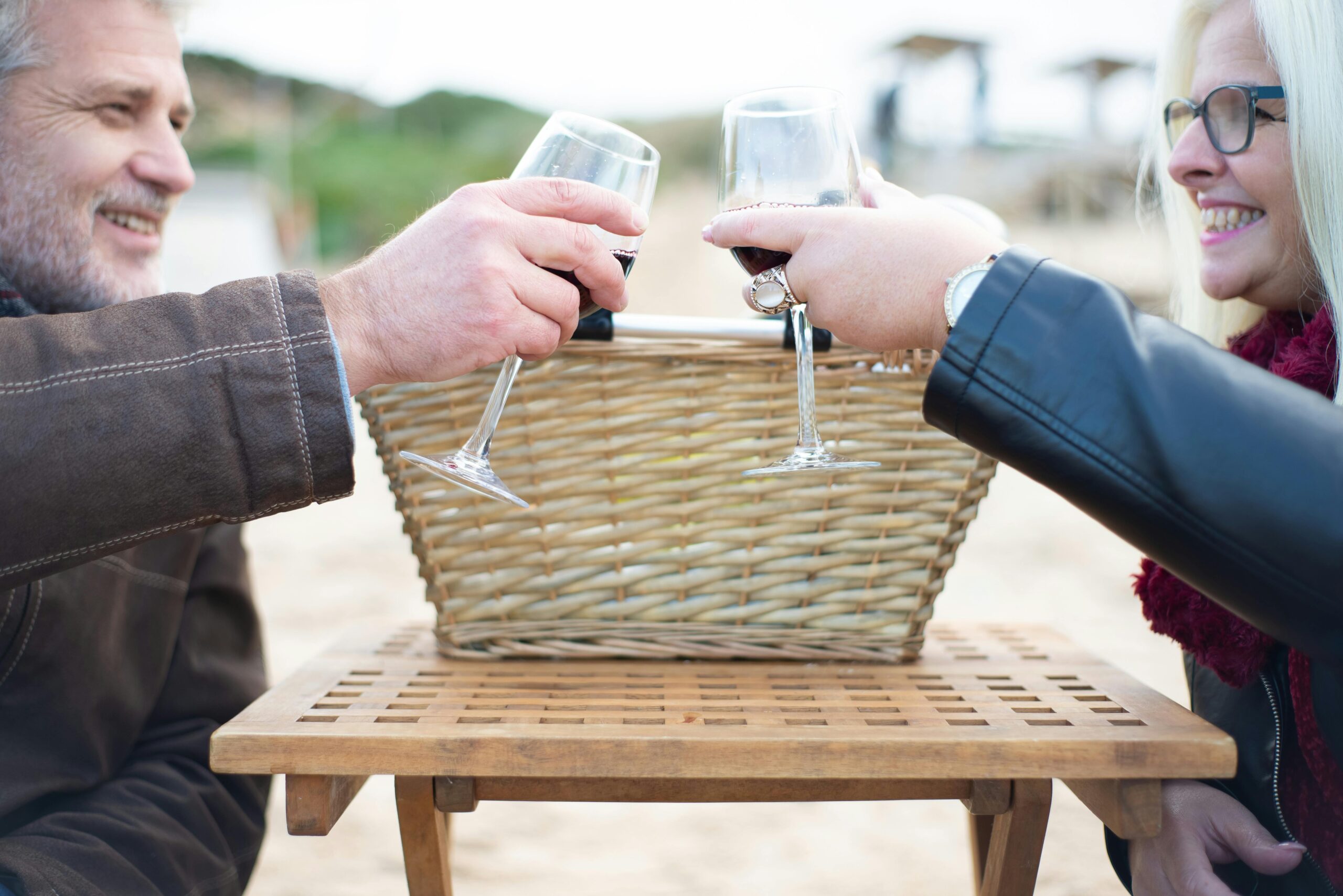 happy retirees drinking wine