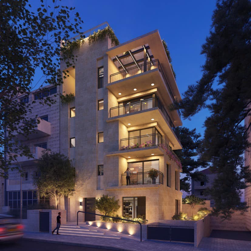 Building Exterior - Nighttime: A beautifully lit residential building at night, highlighting its modern architecture and lush greenery, located at 21 Ha'Ari Street, Rehavia, Jerusalem.