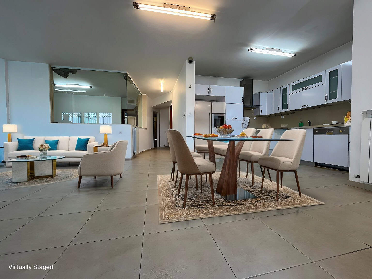 Modern living room and kitchen with dining area.