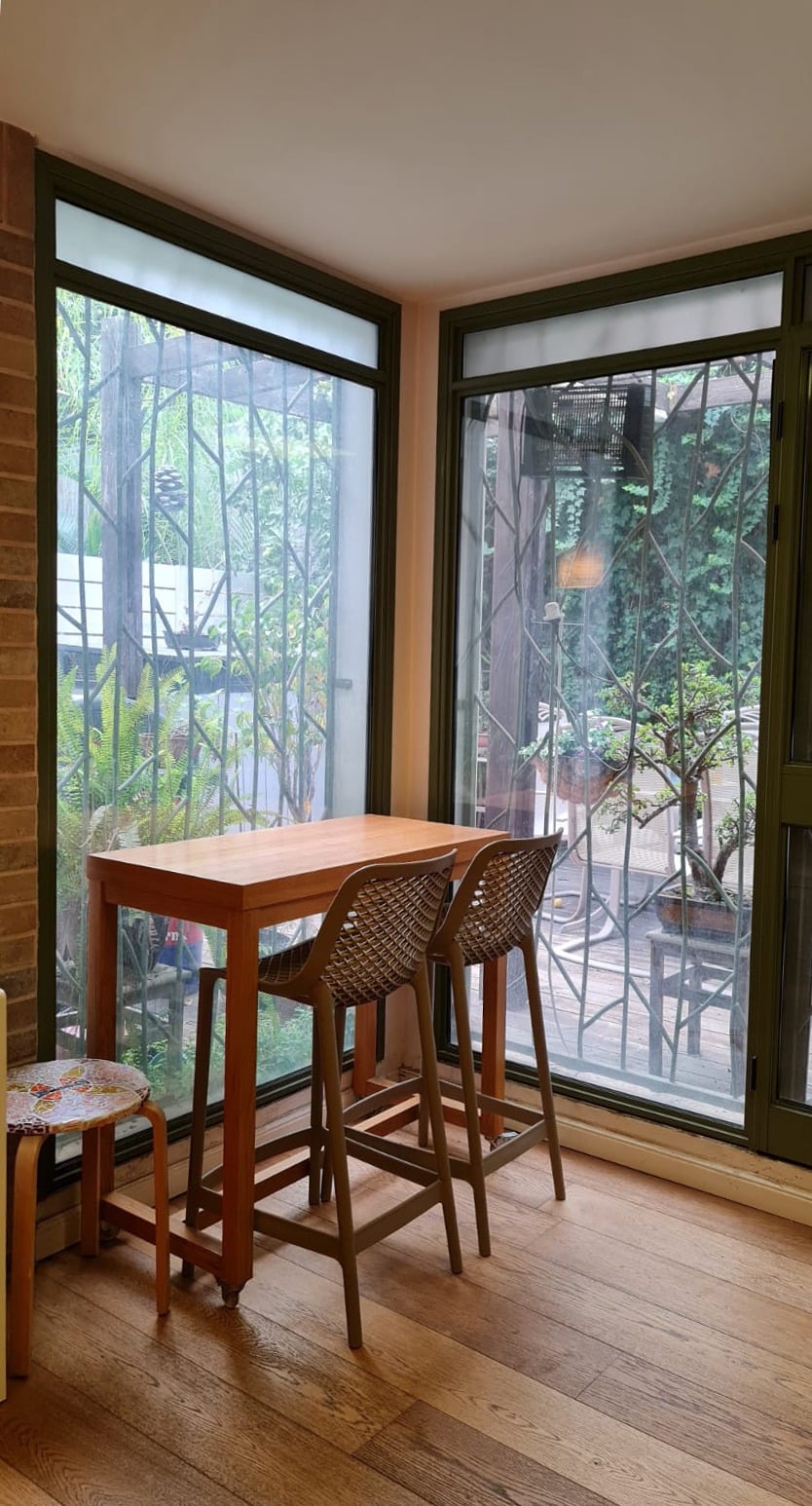 Window-side seating area in the Givat Sharet cottage