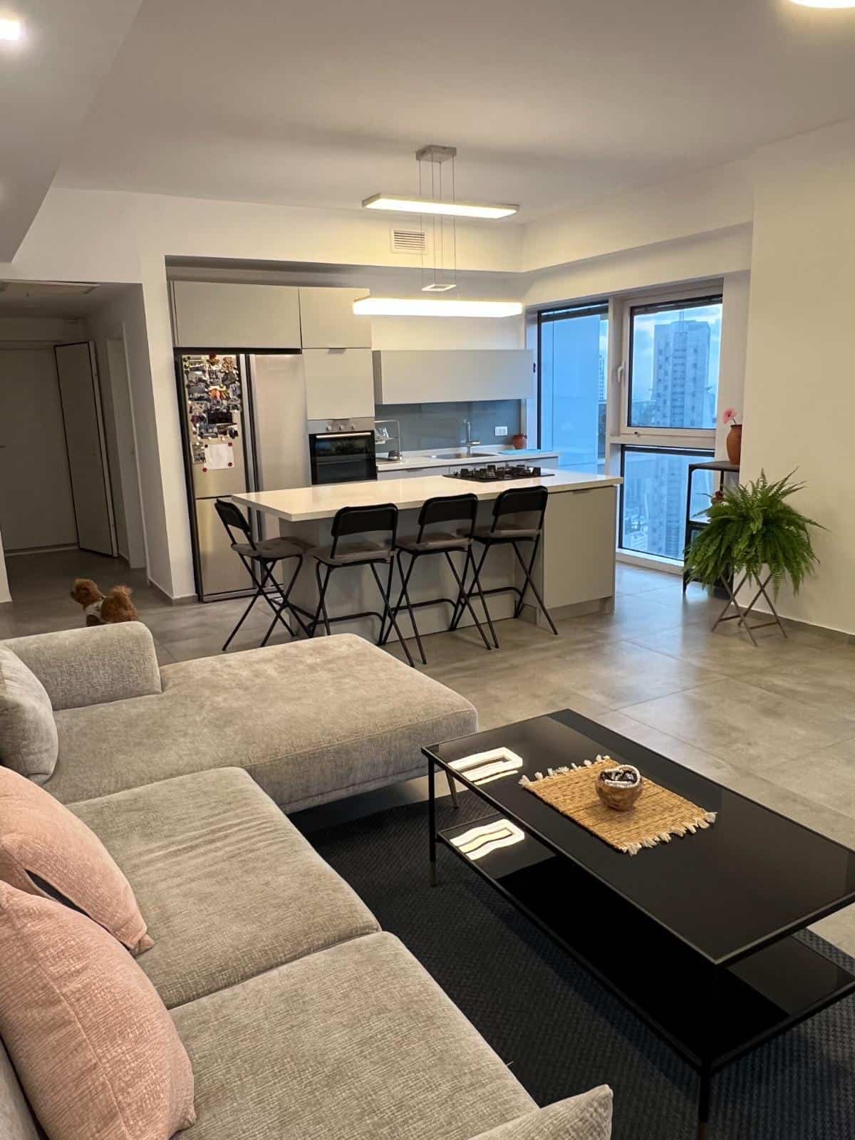 Living room and kitchen at the Midtown Tel Aviv apartment