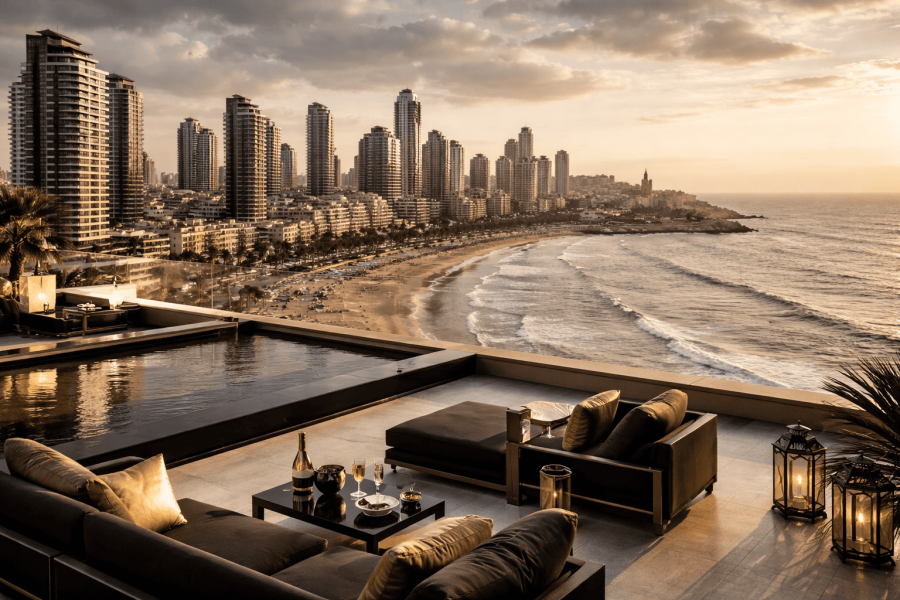 Cityscape by the ocean with modern buildings.