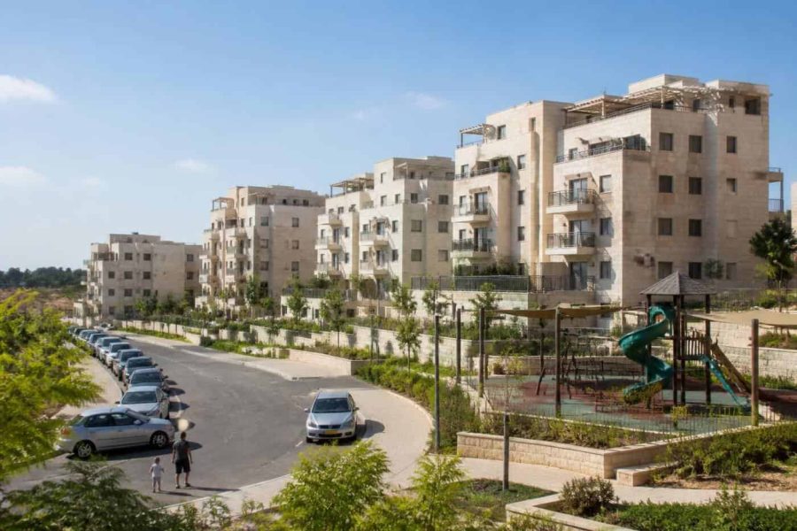 Modern residential apartment buildings in Beit Shemesh with parks and family-friendly streets