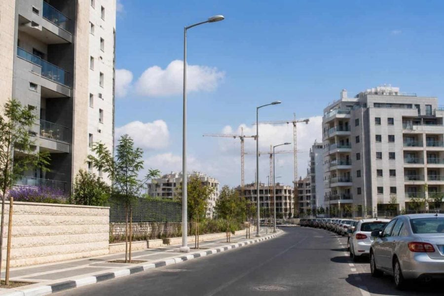 Modern apartment buildings and residential streets in a developing southern Israeli city