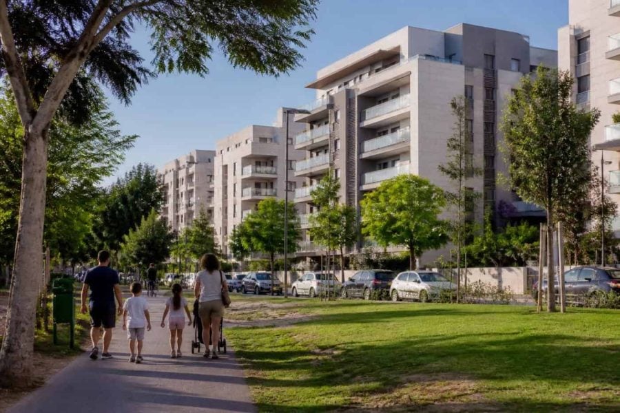 Residential apartment buildings and green public space in Kfar Saba, Israel