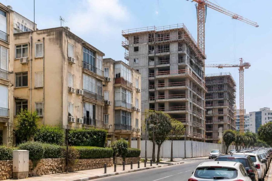 Apartment buildings in Rishon LeZion with urban renewal construction activity nearby
