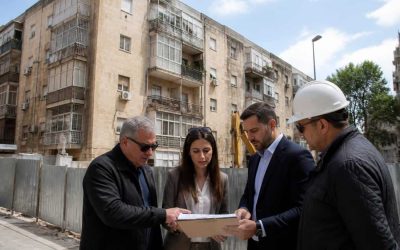 Older residential apartment building in Jerusalem undergoing urban renewal assessment