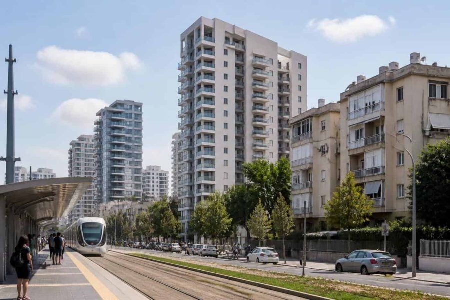 Modern apartment buildings and light rail infrastructure in Petah Tikva urban renewal district
