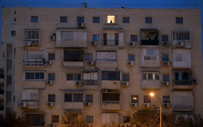 city apartment at twilight with figure