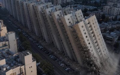 collapsing towers in urban chaos