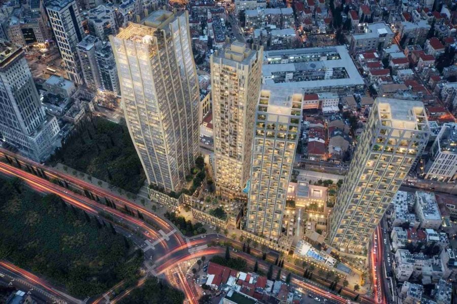 Aerial view of a city with modern skyscrapers.