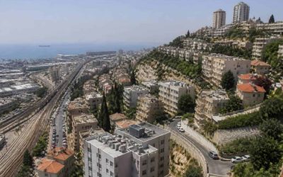 Photorealistic view of Haifa apartment buildings on a hillside with modern urban infrastructure and the Mediterranean coast in the distance