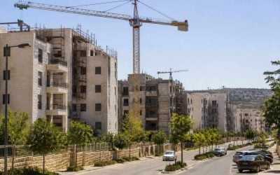 Modern apartment buildings under construction in a growing residential neighborhood in Beit Shemesh