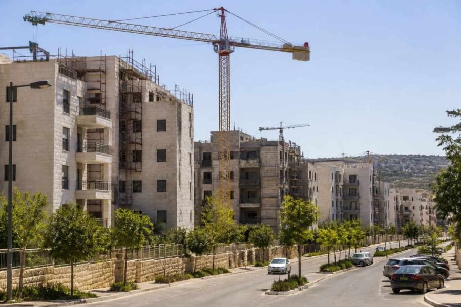 Modern apartment buildings under construction in a growing residential neighborhood in Beit Shemesh