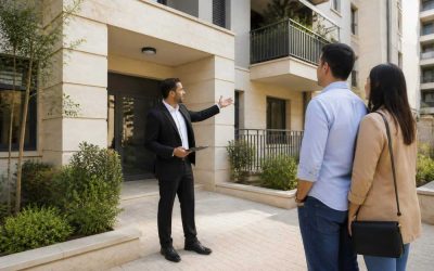 Apartment buildings in Israel with a real estate agent showing a property to prospective buyers