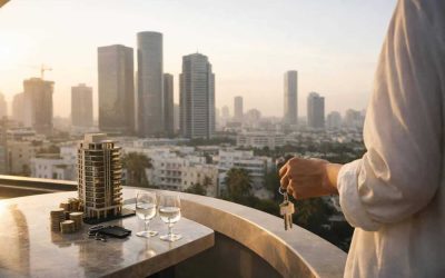 Modern Israeli apartment buildings and construction cranes representing real estate market recovery and 0.7% price surge