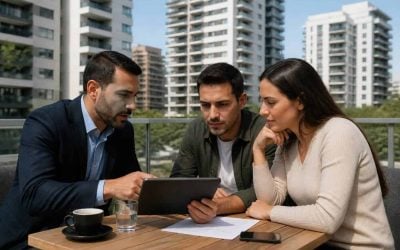 Apartment buildings and a real estate agent showing mortgage documents to prospective buyers in Israel