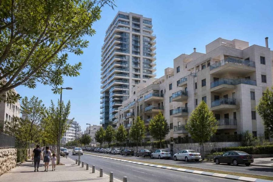 Modern residential towers and family apartment buildings in an Israeli urban neighborhood