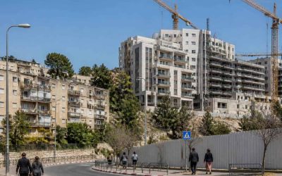 Modern residential redevelopment construction scene in a Jerusalem hillside neighborhood