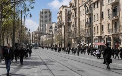 Central Jerusalem street scene near Jaffa Street with residential buildings and pedestrians