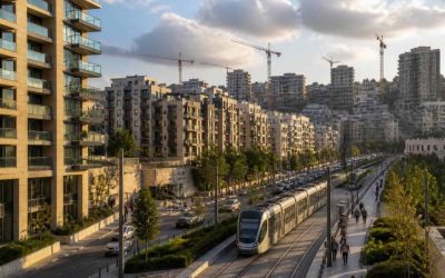 Modern apartment buildings and light rail infrastructure in a Jerusalem residential neighborhood