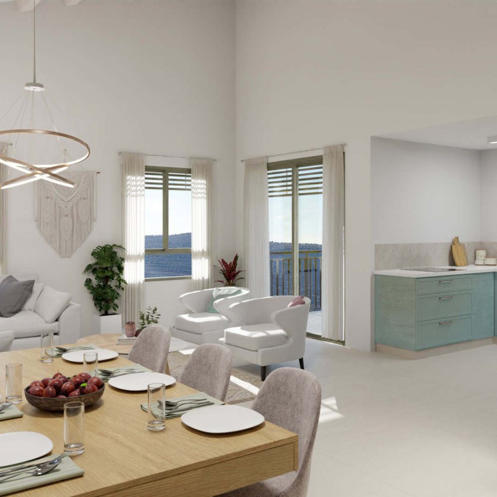 A modern living room with a dining table, white sofa, and a large window overlooking a scenic view.