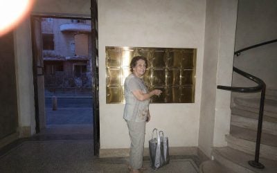 mailbox moment in the entrance hall with an old lady in israel