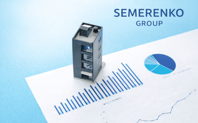 modern apartment building model on housing market charts showing israel property prices