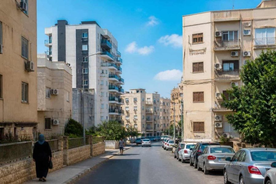 Residential apartment buildings in an affordable Israeli city with modern and older housing blocks