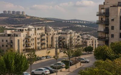 Modern apartment buildings in Ramat Beit Shemesh with residential streets and hillside surroundings
