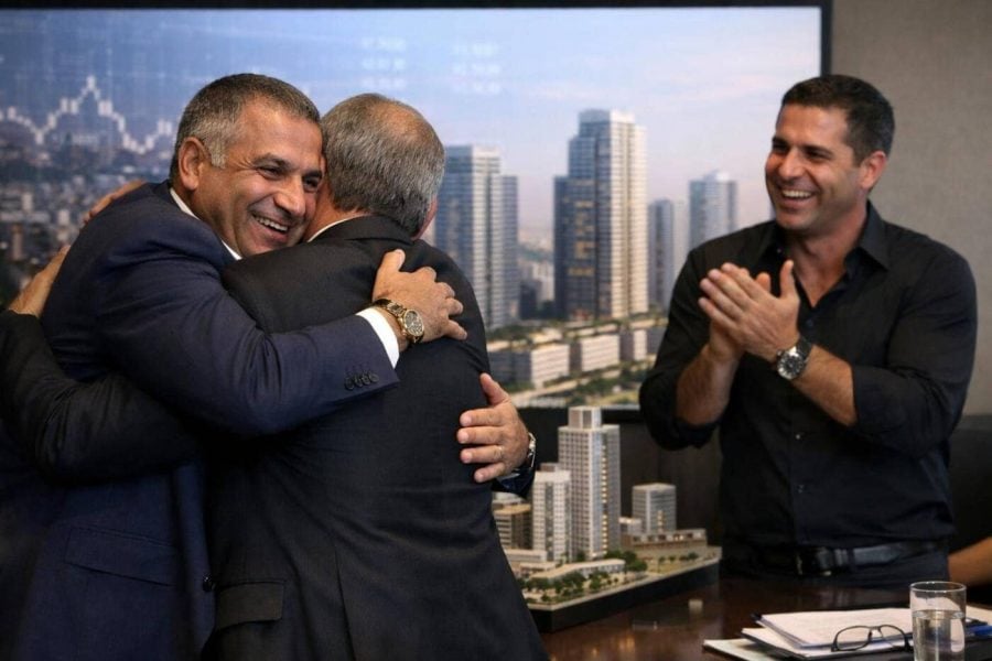 Israel Canada and Acro real estate company logos signifying a 3.1 billion shekel merger