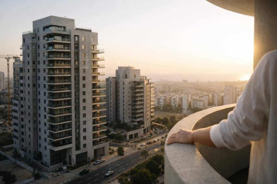 Modern residential apartment buildings under construction in Tel Aviv symbolizing the resilience of the Israeli housing market