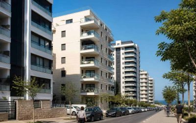 Modern apartment buildings along the Israeli coast with residential balconies and city streets below