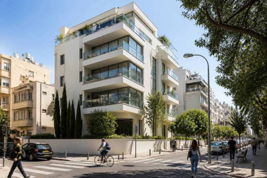 Central Tel Aviv apartment building near a busy urban street