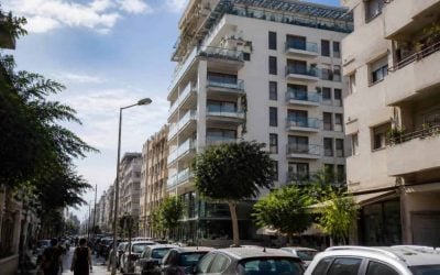 Apartment buildings in central Tel Aviv viewed from a city street in daylight