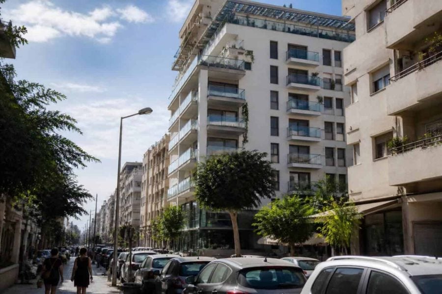 Apartment buildings in central Tel Aviv viewed from a city street in daylight