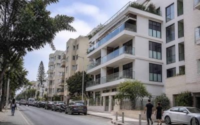 Modern apartment buildings and a quiet residential street in Tel Aviv