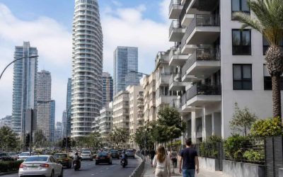Apartment buildings and street traffic in central Tel Aviv during a busy day
