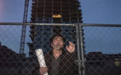 worried man at construction site at dusk in israel